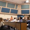 Stadium seating filled with students in a large auditorium